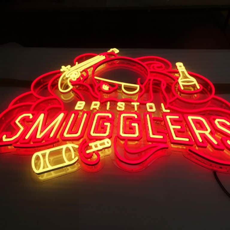 Squid and bottle faux neon bar sign with narrow LED for Bristol Smugglers. Neonplus neon alternatives in red and gold.