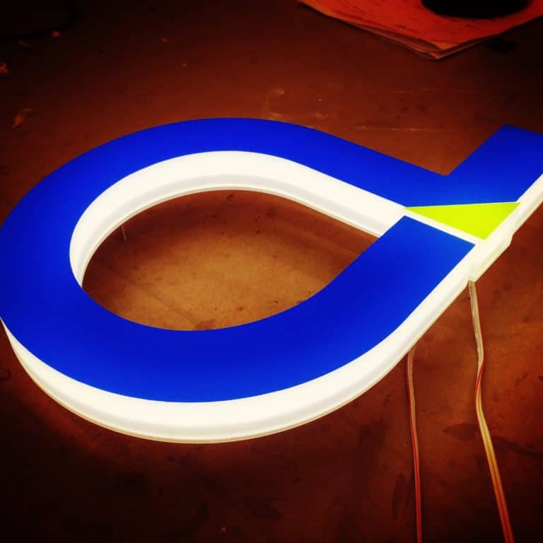 Backlit Dnata company logo signs made with artificial neon and colour transfers. Brand accurate faux neon signs made to order by NeonPlus