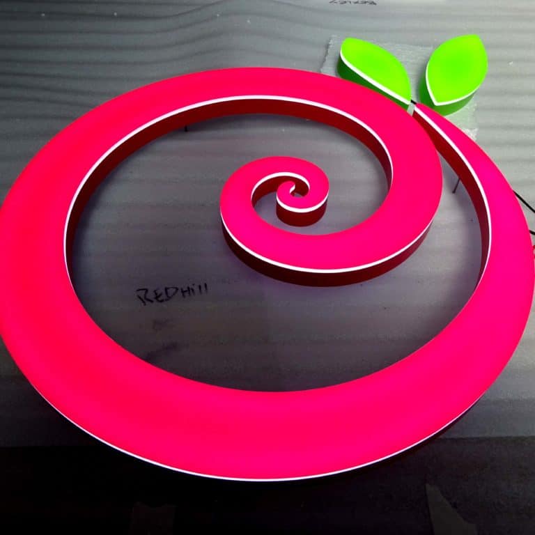 Pink spiral Pinkberry apple logo with translucent faces by NeonPlus