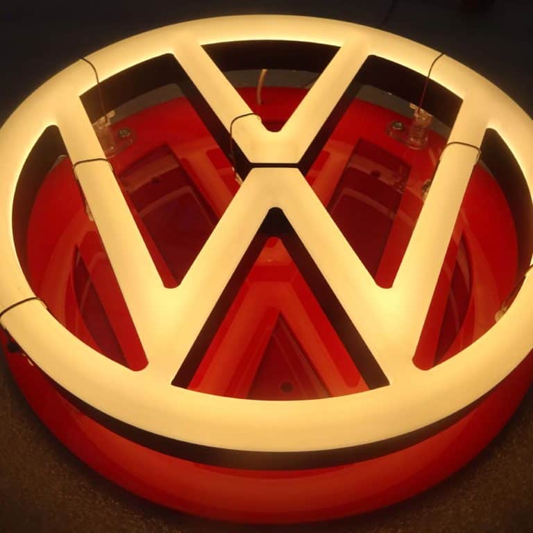 Warm white VW LED neon sign with red gloss acrylic backing for camper van
