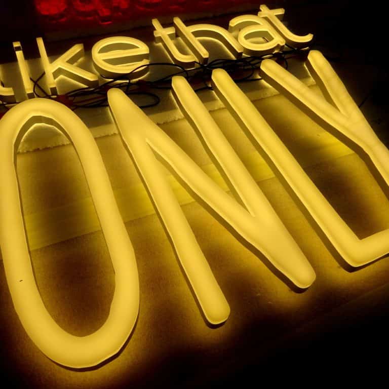 Warm white faux neon sign. 'Like that only'