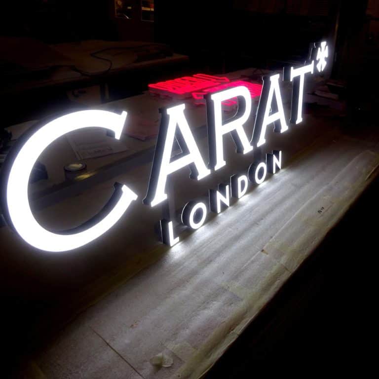 Brand Logo neon sign for Carat London made with weather resistant faux neon LEDs.