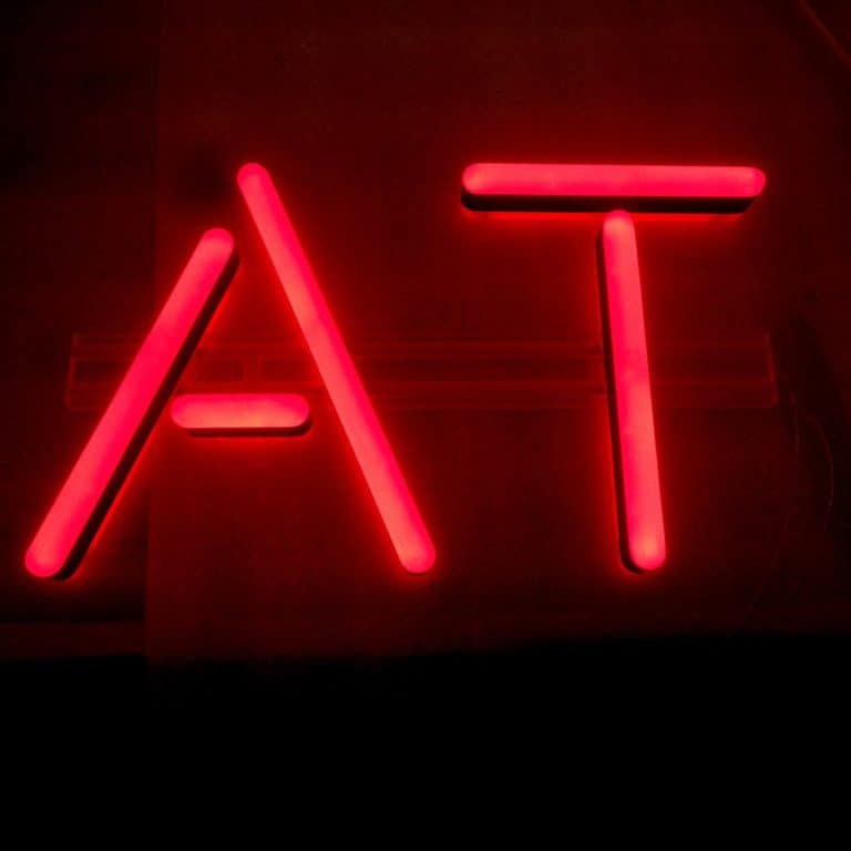 Red block lettering in faux neon, ideal for shop-fitting and sign making. Custom text for artificial neon signs, from Neonplus