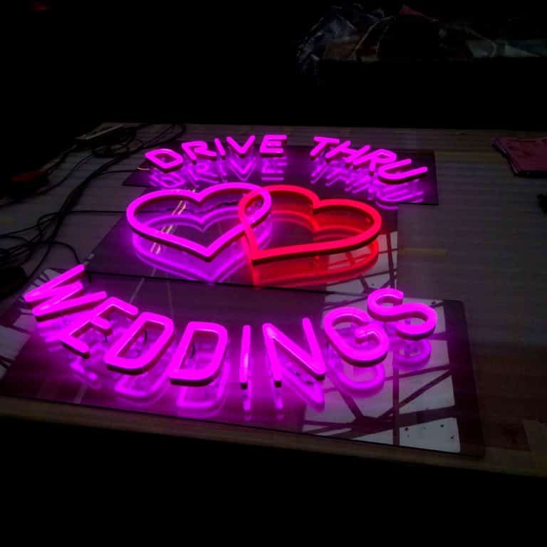 Pink Neon Heart Sign for Drive Thru Weddings. Las Vegas style artificial neon signs from Neonplus