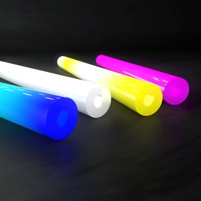 Four NP Tubes laying side by side in blue, white, yellow and pink