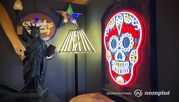 neon skull and statue of liberty